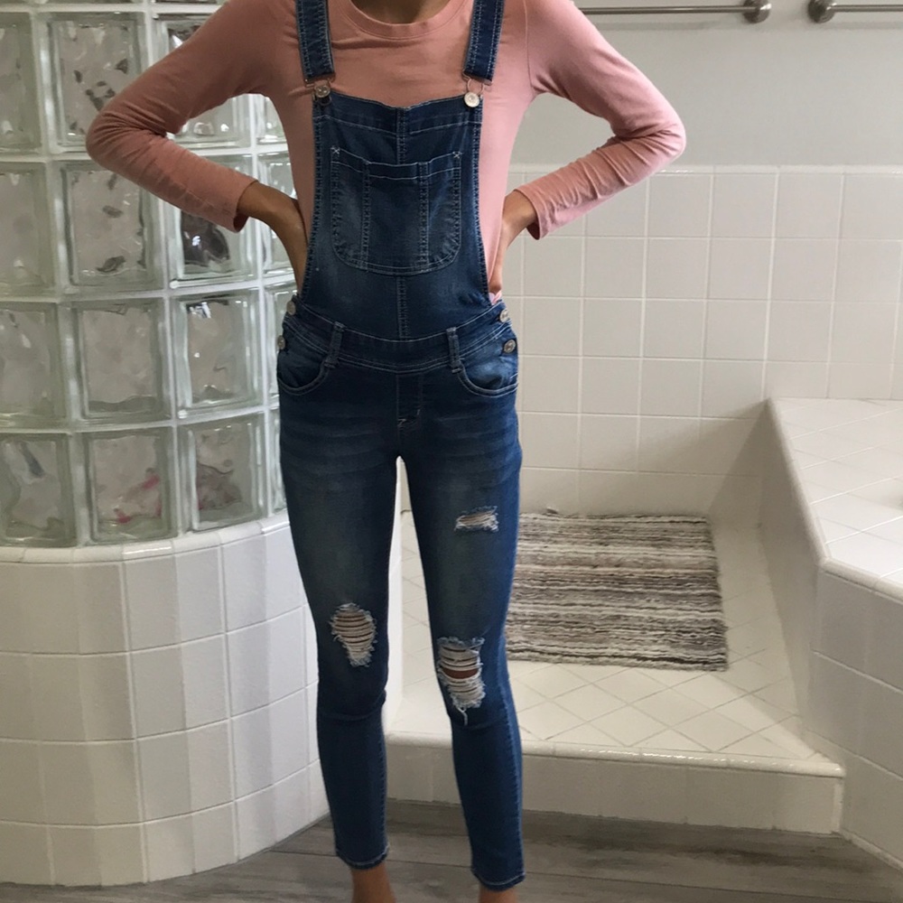Super cute overalls with rips on legs